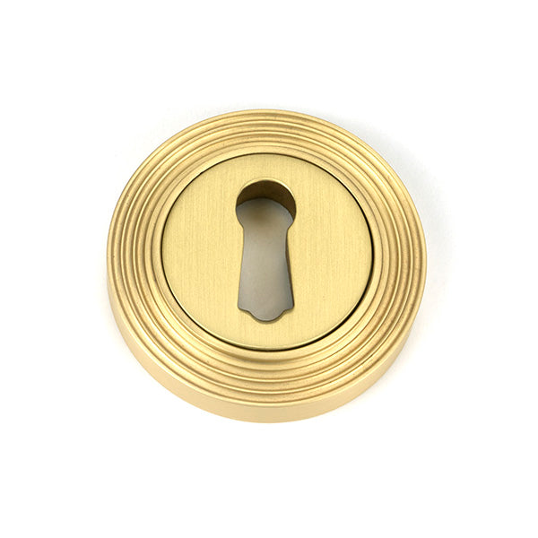 Satin Brass Round Escutcheon (Beehive)