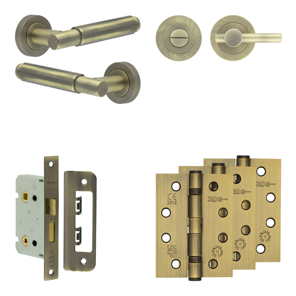 Complete Bloom Door Handle Pack - Bathroom - Antique Brass - 65mm / 4" / Easy Thumb Turn & Lock