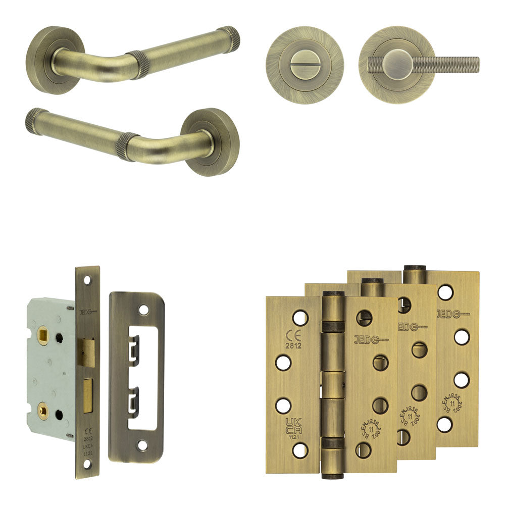 Complete Midtown Door Handle Pack - Bathroom - Antique Brass - 65mm / 4" / Bari Knurled Turn & Release